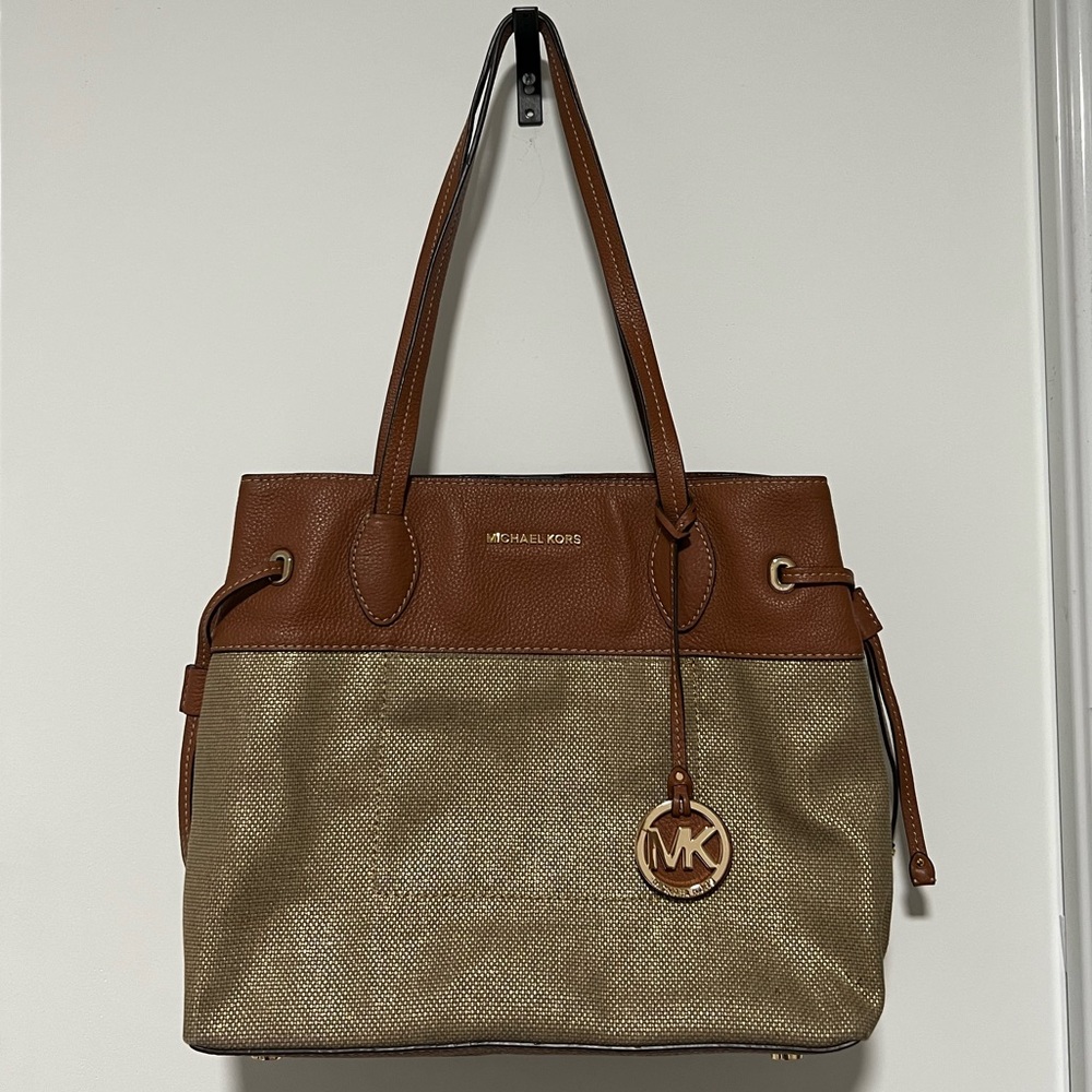 Tan and gold Michael Kors handbag slightly used